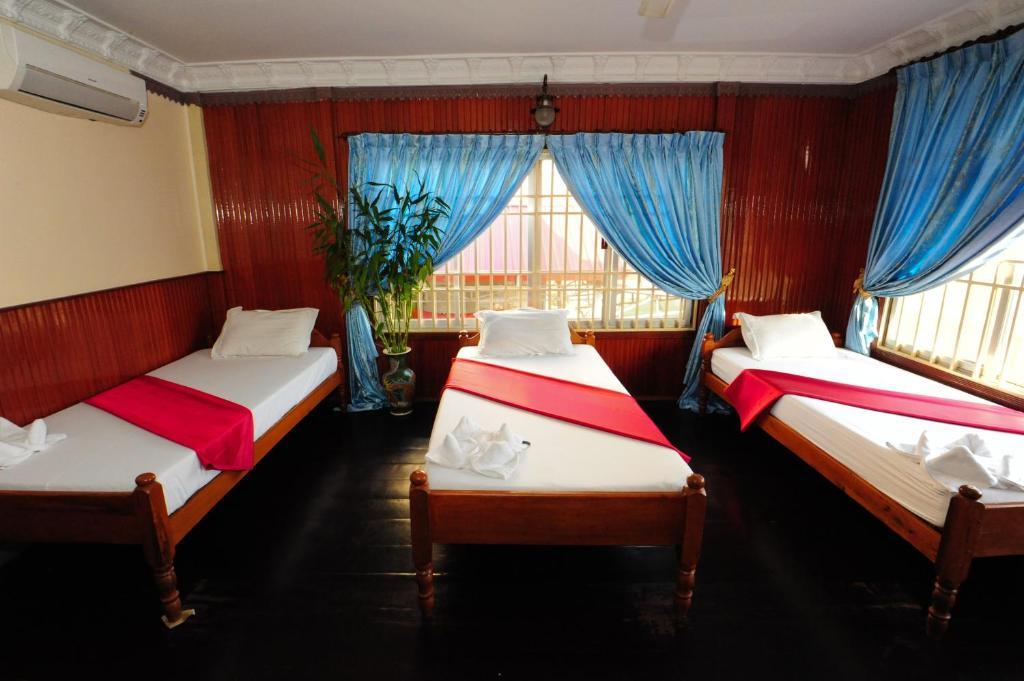 Okay Guesthouse Phnom Penh Zimmer foto